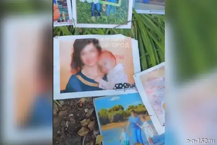 Photos from a Mother's Day exhibition were dumped near the cemetery in Pavlov.